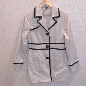 Ambition tan trench coat with black trim. Size medium